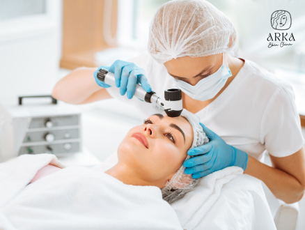 A skin specialist at Arka Skin Clinic helping a client with a skin treatment.
